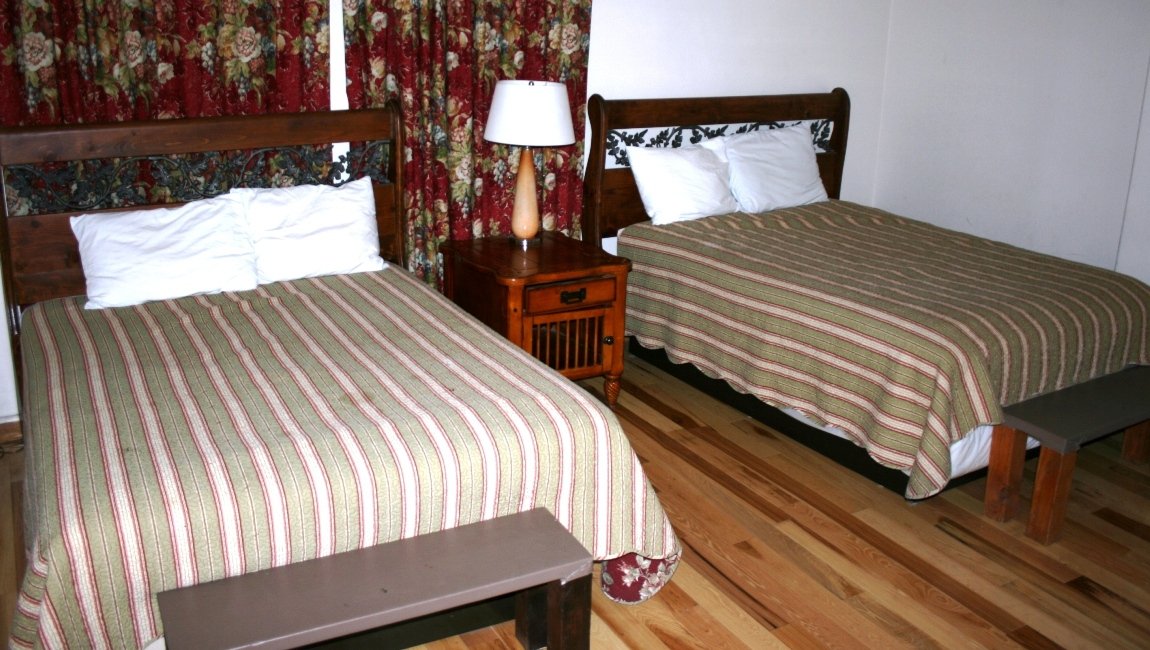 The Lakehouse Bedroom 2 with 2 Queen Beds