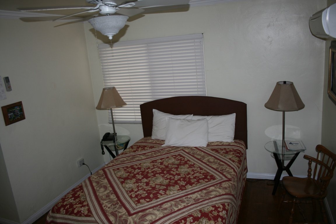 The Raccoon Lodge Room 22 Bedroom with Queen Bed